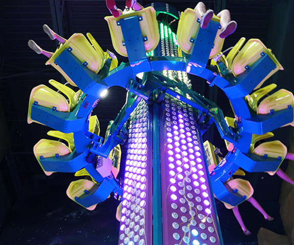a bunch of kids riding the new maximum foolocity ride